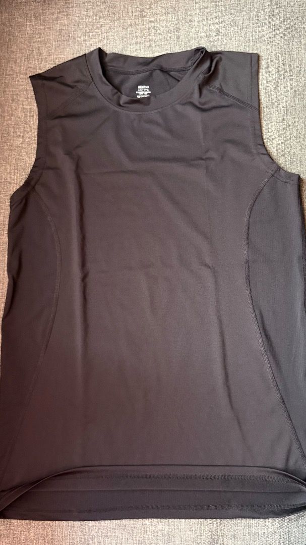 Bench Active Compression Tank Top | L | Black (Category: Activewear) located in Cainta. Submitted by goodstuffxiv (Listing ID 1465018297, Image 1). Description: - Brand/Model: Bench Active Compression Tank Top - Color: Black - Size: L - Material: 87% polyester, 13% elastan - Design: Crew neck, sleeveless, side panel stitching, and logo print near the back collar - Features: Breathable fabric with UPF 140 sun protection rating - Used less than 3 t