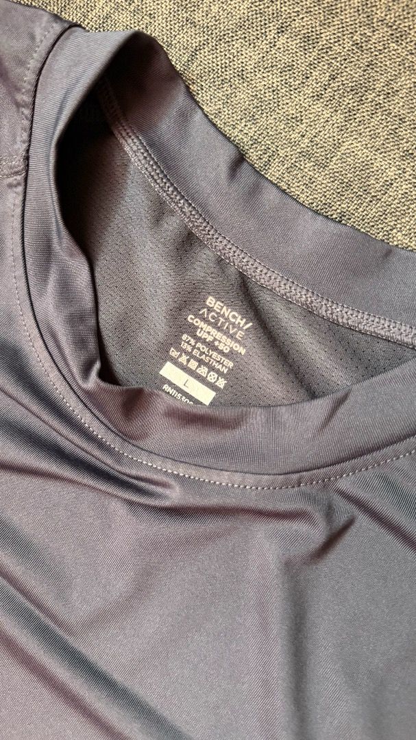Bench Active Compression Tank Top | L | Grey (Category: Activewear) located in Cainta. Submitted by goodstuffxiv (Listing ID 1465019366, Image 3). Description: - Brand: Bench Active - Item: Compression shirt - Color: Grey - Size: L - Sun Protection: Built-in UPF +50 - Material: 87% polyester, 13% elastane (super stretchy) - Neckline: Crew neck - Condition: Clean, great for workouts and outdoor runs - Used less than 3 times MOP: GCash or bank tran