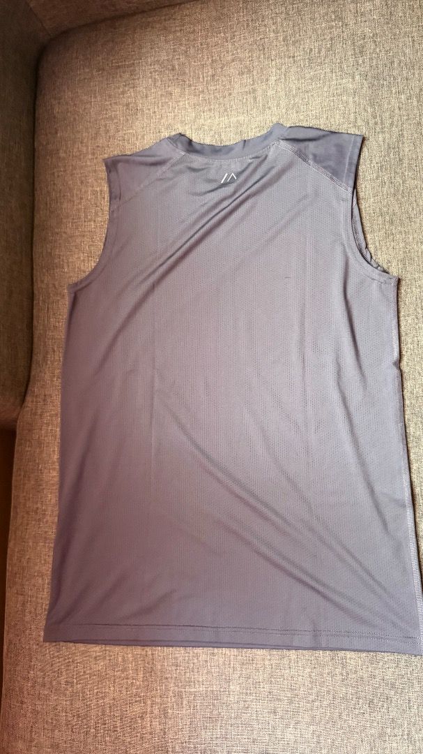 Bench Active Compression Tank Top | L | Grey (Category: Activewear) located in Cainta. Submitted by goodstuffxiv (Listing ID 1465019366, Image 2). Description: - Brand: Bench Active - Item: Compression shirt - Color: Grey - Size: L - Sun Protection: Built-in UPF +50 - Material: 87% polyester, 13% elastane (super stretchy) - Neckline: Crew neck - Condition: Clean, great for workouts and outdoor runs - Used less than 3 times MOP: GCash or bank tran