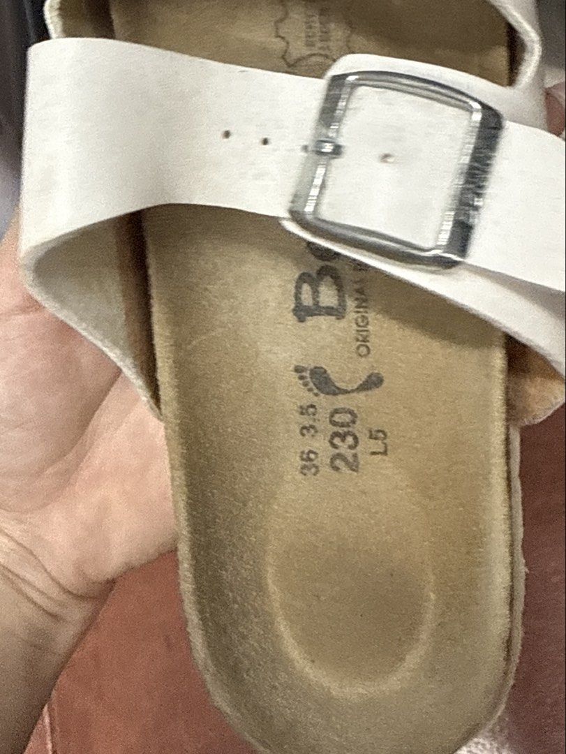 Betula White Double Strap Sandals Size 36 230 (Category: Flats & Sandals) located in Manila. Submitted by fastlion.584bdf (Listing ID 1465061768, Image 3). Description: - Brand/Model: Betula Double Strap Sandals - Color: White - Size: 36 (230 mm) - Material: Cork footbed with suede lining and silver-tone metal buckles - Condition: Normal signs of wear on the straps and footbed - Style: Super comfy, easy slip-on, perfect for casual daily outfits.