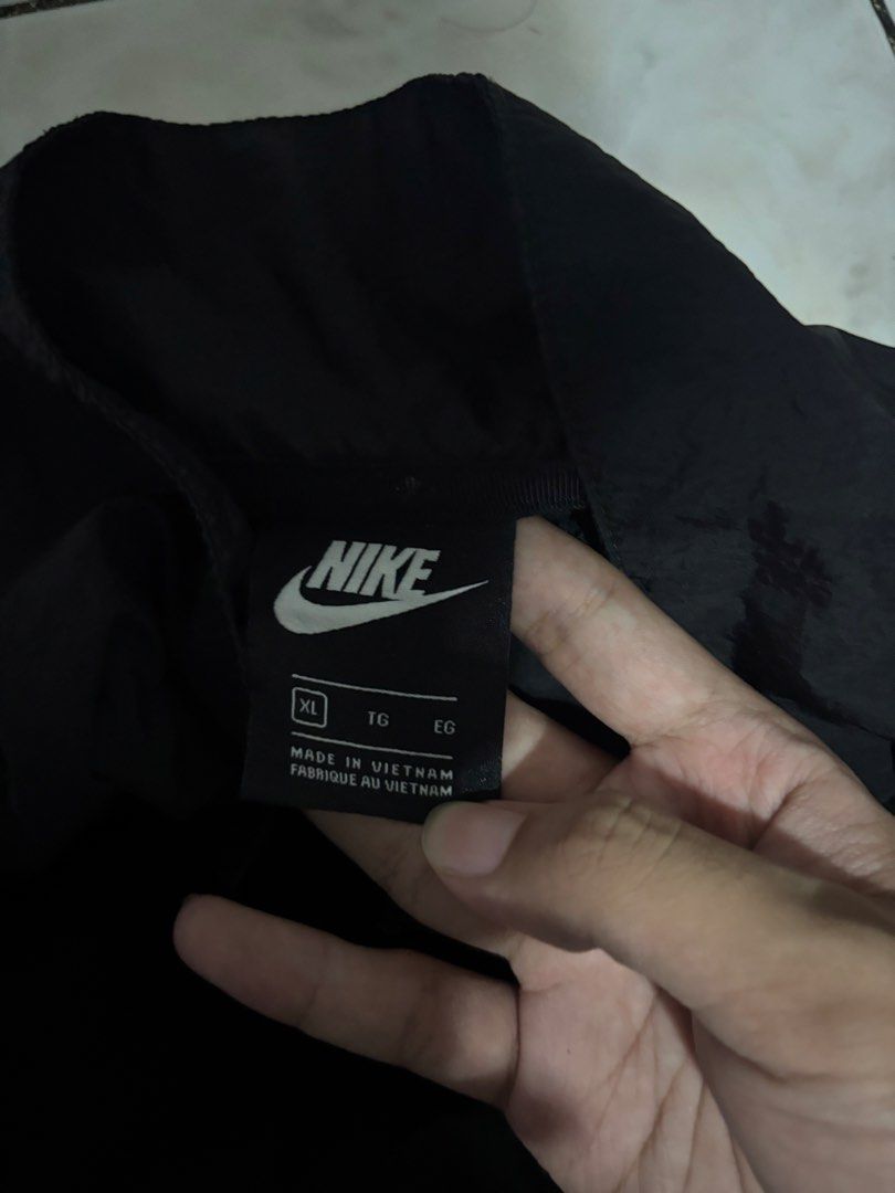 BIG SWOOSH NIKE WINDBREAKER (Category: Coats, Jackets and Outerwear) located in Caloocan City. Submitted by thriftnikylee (Listing ID 1465012025, Image 3). Description: LIKE NEW 2 pcs Available We can chat on facebook or ig for vouch and transaction Dm me .