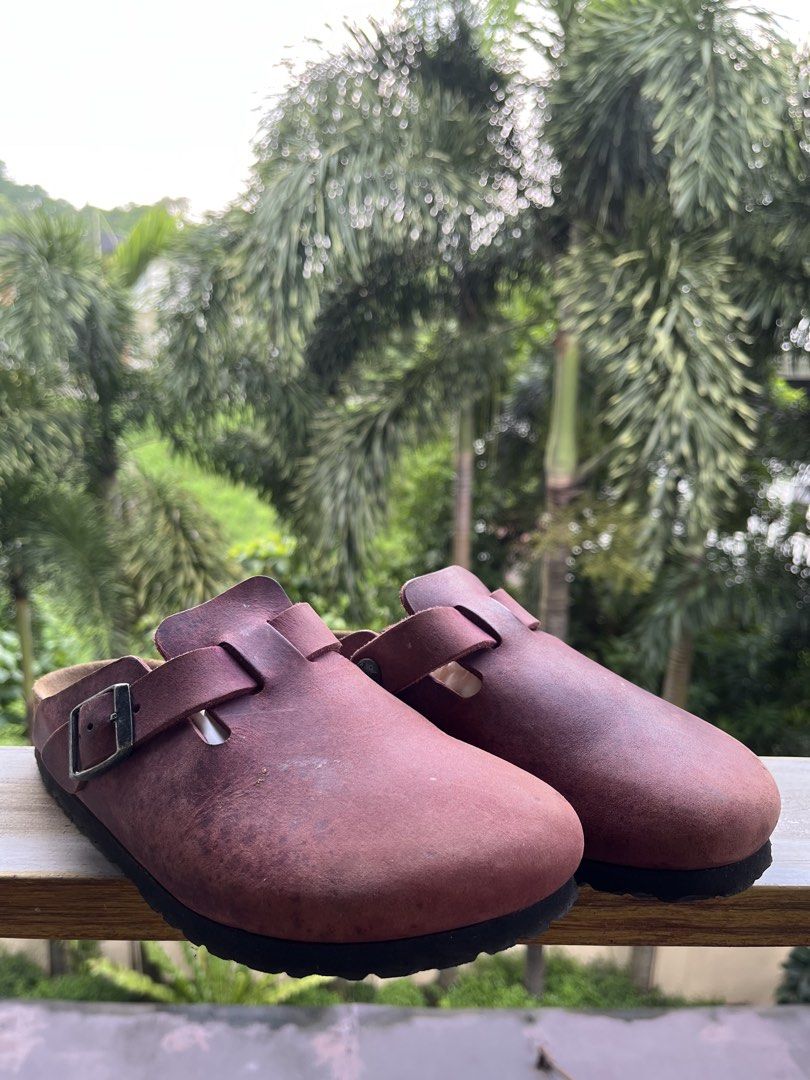 Birkenstock Boston Oiled Leather Clogs Maroon Size 37 (Category: Flats & Sandals) located in Manila. Submitted by tanfinds (Listing ID 1464986515, Image 1). Description: - Brand: Birkenstock Boston Clogs - Color/Material: Maroon Oiled Leather with natural character - Size: 37 Regular Width (240) - Condition: Pre-loved with cork darkening, minor sole scuffs, and slight heel wear - Features: Slip-on design with adjustable metal pin buckle strap - S