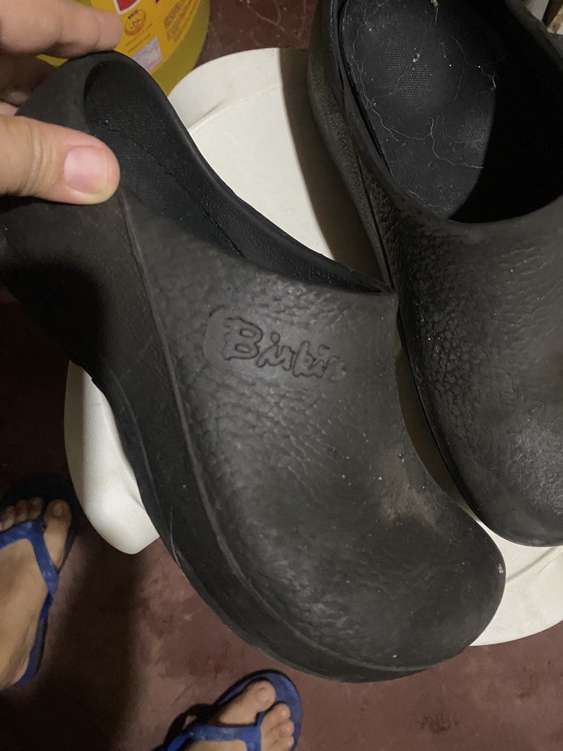 Birki's Black Clogs Size 36-37 (Category: Slippers and slides) located in Manila. Submitted by applemint011 (Listing ID 1465047385, Image 2). Description: - Brand: Birki's - Style: Slip-on clogs - Color: Black - Size: 36-37 / 230 - Material: Textured outer with rubber soles and grip tread - Condition: Pre-owned with dust, lint, and wear on footbeds and outsoles; needs a good clean.