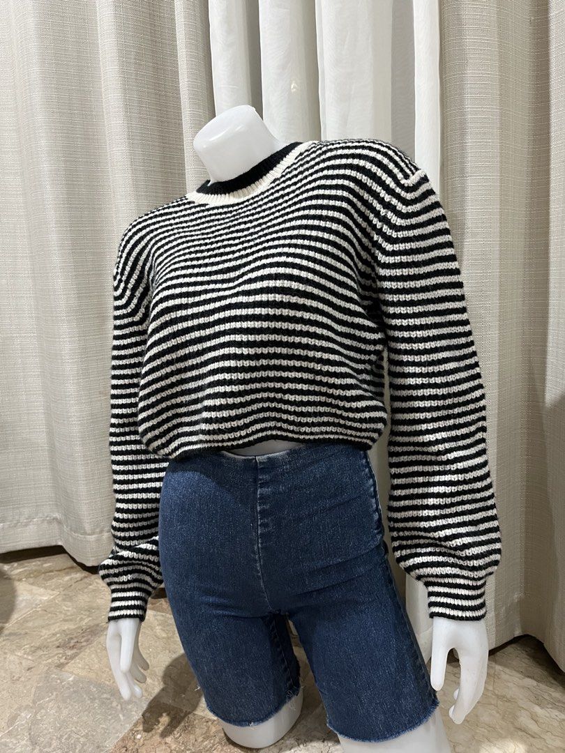 Black and White Striped Knit Sweater Size S (Category: Longsleeves) located in Tarlac. Submitted by thriftygoodss (Listing ID 1465100352, Image 3). Description: - Color/Pattern: Black and white stripes - Size: S - Fit: Slightly cropped with long sleeves - Details: Crew neckline, ribbed collar and cuffs, chunky knit texture - Condition: Clean fabric, no stains, no holes.