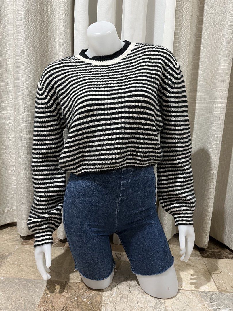 Black and White Striped Knit Sweater Size S (Category: Longsleeves) located in Tarlac. Submitted by thriftygoodss (Listing ID 1465100352, Image 1). Description: - Color/Pattern: Black and white stripes - Size: S - Fit: Slightly cropped with long sleeves - Details: Crew neckline, ribbed collar and cuffs, chunky knit texture - Condition: Clean fabric, no stains, no holes.