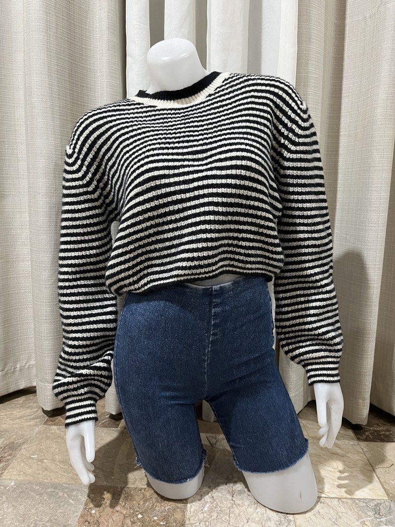 Black and White Striped Knit Sweater Size S (Category: Longsleeves) located in Tarlac. Submitted by thriftygoodss (Listing ID 1465100352, Image 2). Description: - Color/Pattern: Black and white stripes - Size: S - Fit: Slightly cropped with long sleeves - Details: Crew neckline, ribbed collar and cuffs, chunky knit texture - Condition: Clean fabric, no stains, no holes.