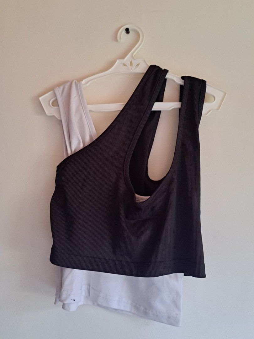 Black and White Two Piece Racerback Tank Top (Category: Sleeveless) located in Manila. Submitted by yselles__ (Listing ID 1464981919, Image 3). Description: - Material: Stretchy, comfortable fabric ideal for workouts or casual days - Condition: Excellent, no flaws, never used.