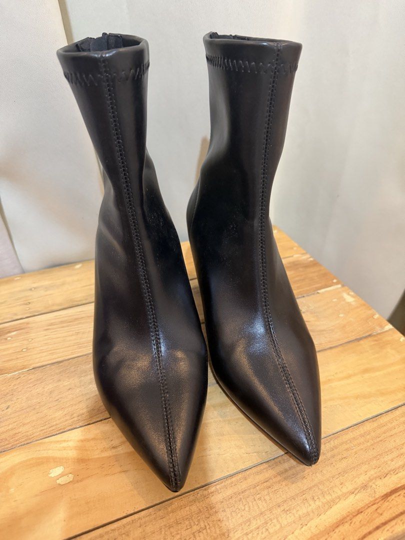 Black ankle boots with heels (Category: Boots) located in Dinalupihan. Submitted by tereypach (Listing ID 1465132624, Image 2). Description: - Color: Black - Size: EU 35 / UK 2 / US 4 - Design: Ankle boots with chic flared heels and pointed toe - Closure: Convenient back zipper - Meetup location: Dinalupihan, Bataan.