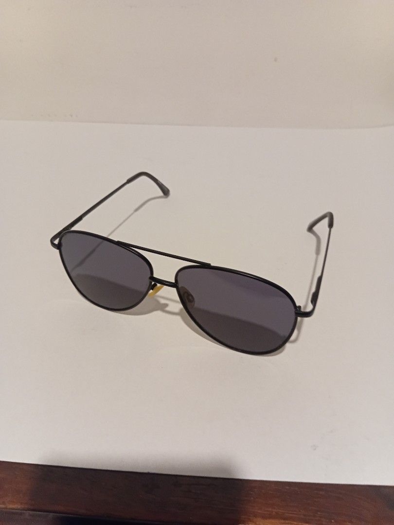 SUNNIES Black Aviator Sunglasses (Category: Sunglasses & Eyewear) located in Marikina City. Submitted by nico.outlet (Listing ID 1465017050, Image 1). Description: - Style: Classic aviator with metal frame and double brow bar - Lenses: Dark tinted for sun protection - Comfort: Lightweight build, adjustable nose pads, and curved temples - Use: Ideal for everyday wear and versatile styling.