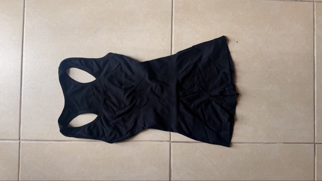 Black bodysuit one piece (Category: Rompers) located in Makati City. Submitted by chie_3030 (Listing ID 1465001478, Image 2). Description: - Color: Black - Style: Sleeveless romper with scoop neck and back - Fit: Fitted cut, Size S (tag attached) - Material: 85% polyamide, 15% elastane (super stretchy) - Ideal for: Casual day outs or workouts or outdoor activities - Condition: like new Brand: Hottie Diary from TikT0k.