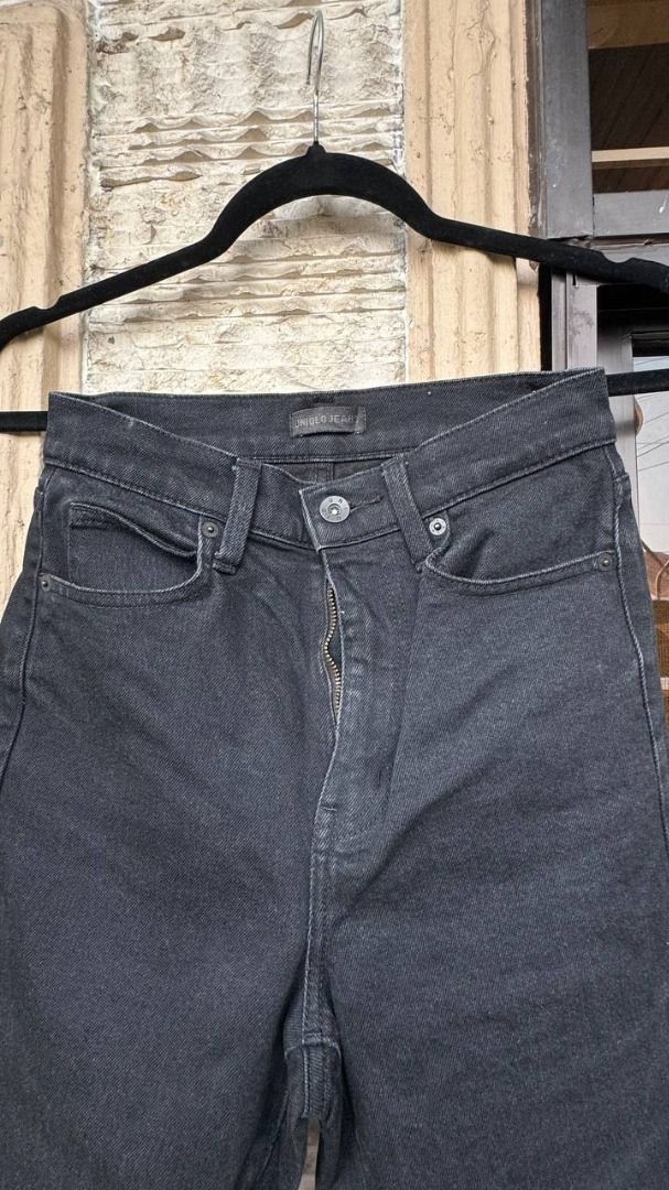 Black denim flare jeans (Category: Jeans) located in Manila. Submitted by tmicmd1989 (Listing ID 1465048147, Image 1). Description: - Color: Solid black with dark wash tone - Fit: High-waist with a stylish flared leg cut - Details: Zipper fly, button closure, belt loops, and standard front pockets - Style: Simple and classic, easy to pair with tees or sweaters - Condition: Brand new / Excellent quality.