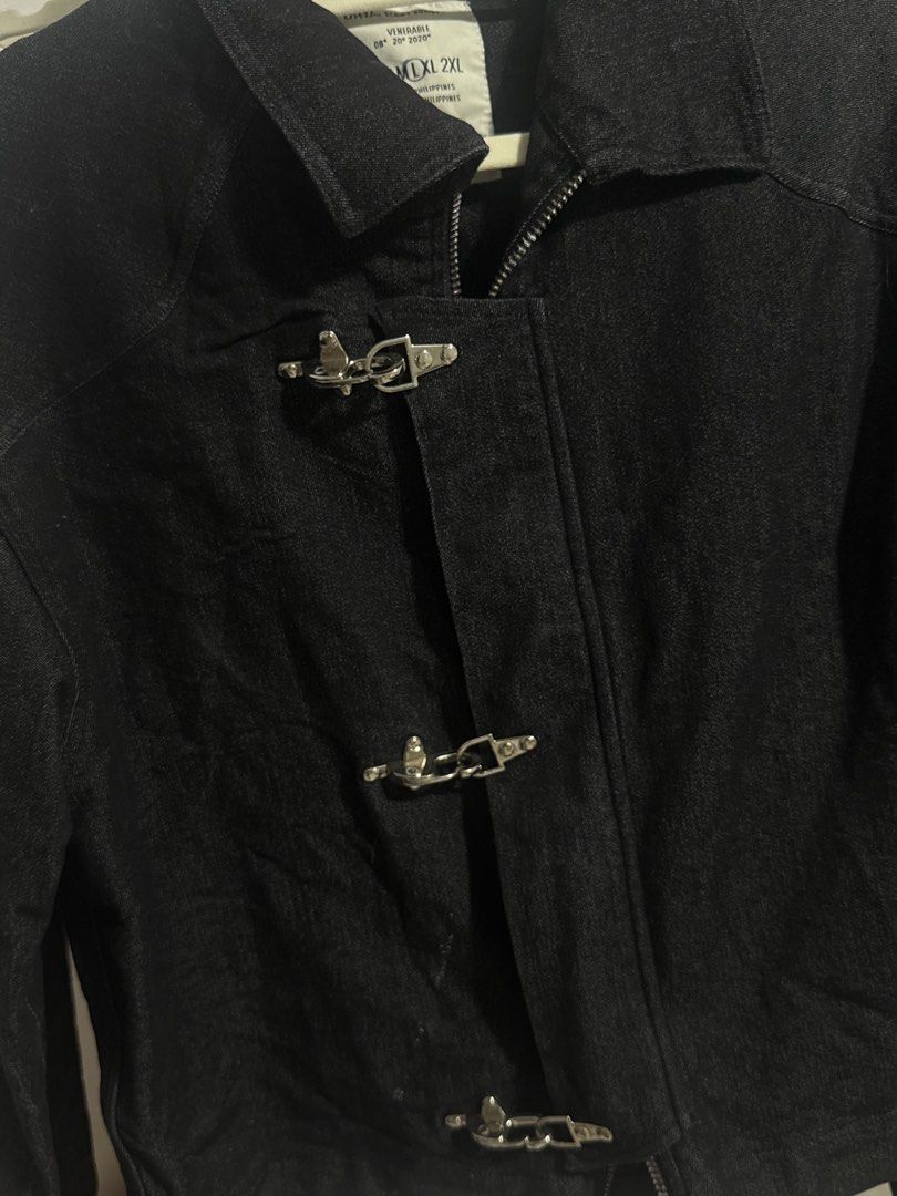 Black Denim Jacket with Silver Toggle Clasps and Zipper (Category: Coats, Jackets and Outerwear) located in Caloocan City. Submitted by livebird_8fda5f (Listing ID 1465136148, Image 3). Description: BRAND: DWN by Script | Fireman Clasp Double Zip Jacket | Classic Menswear Stylish - Color: Black - Material: Durable denim work jacket - Closure: Full zipper with a front storm flap and silver metal toggle clasps - Design: Structured collar, raglan sl