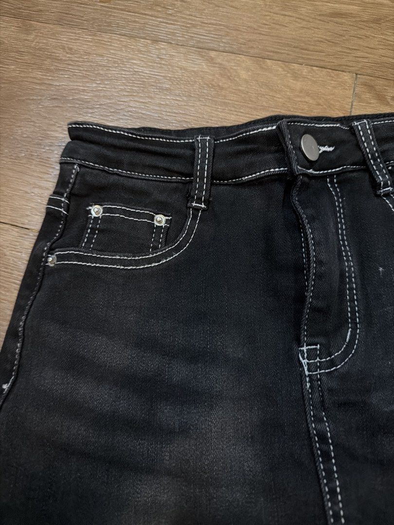 Black Denim Skort White Stitching Size S (Category: Skirts) located in Paranaque City. Submitted by TrendyBoutique.ph (Listing ID 1465015427, Image 2). Description: - Style: Casual black denim skort with a trendy faded wash front - Comfort: Built-in shorts underneath for worry-free movement - Details: Contrast white stitching, silver button, and zipper fly - Storage: Fully functional pockets - Fit: Regular fit, easy to match with tees and crop to