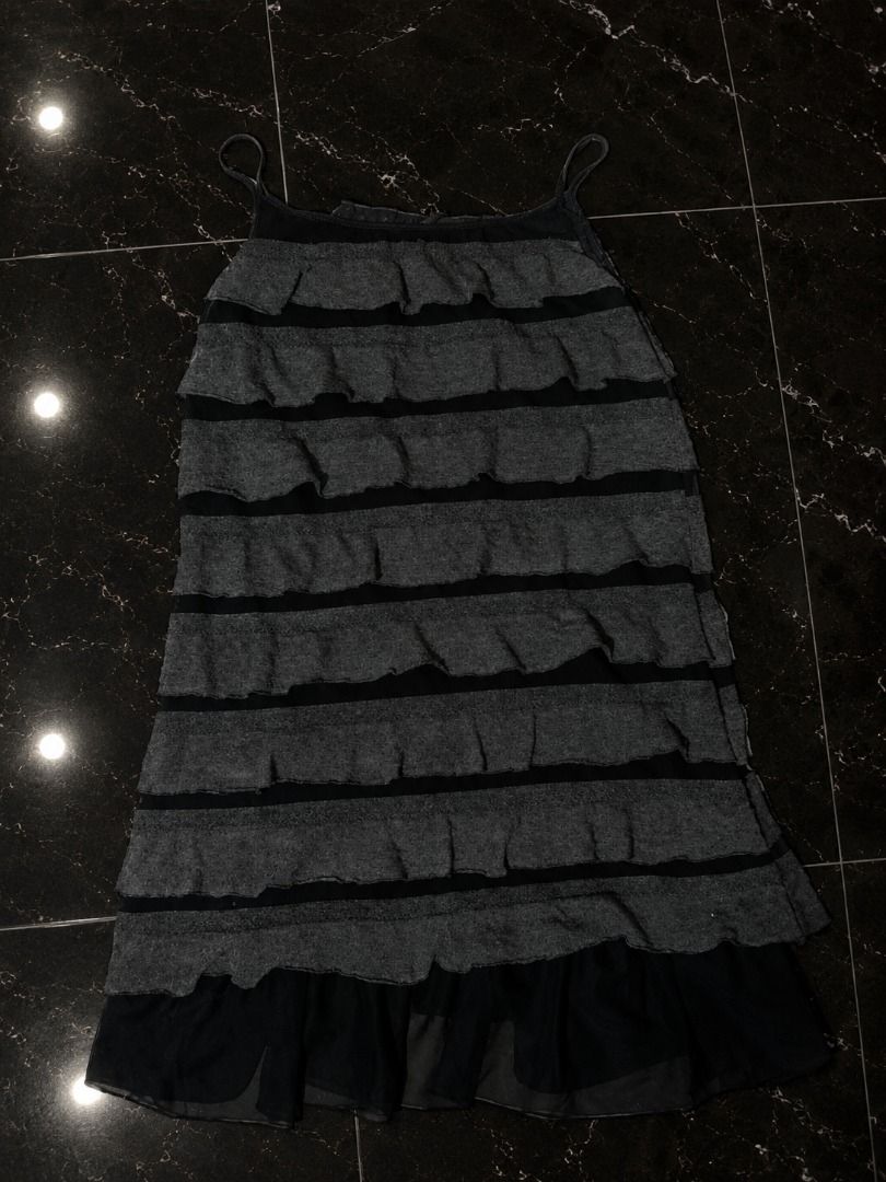 Black Fitted Ruffle Semi-Dress (Category: Dresses) located in Manila. Submitted by sakki.ph (Listing ID 1465132958, Image 1). Description: Size: S-M Cute black fitted semi-dress with multiple layered ruffle details and a sheer mesh hem. Has a simple cami-style top with thin straps and a fitted silhouette. #FittedDress #SemiDress #RuffleDress #RuffleTop #BlackDress #BlackTop #Y2K #Y2KFashion #Y2KStyle #AltFashion #GirlyStyle #LayeredRuffles #Sheer