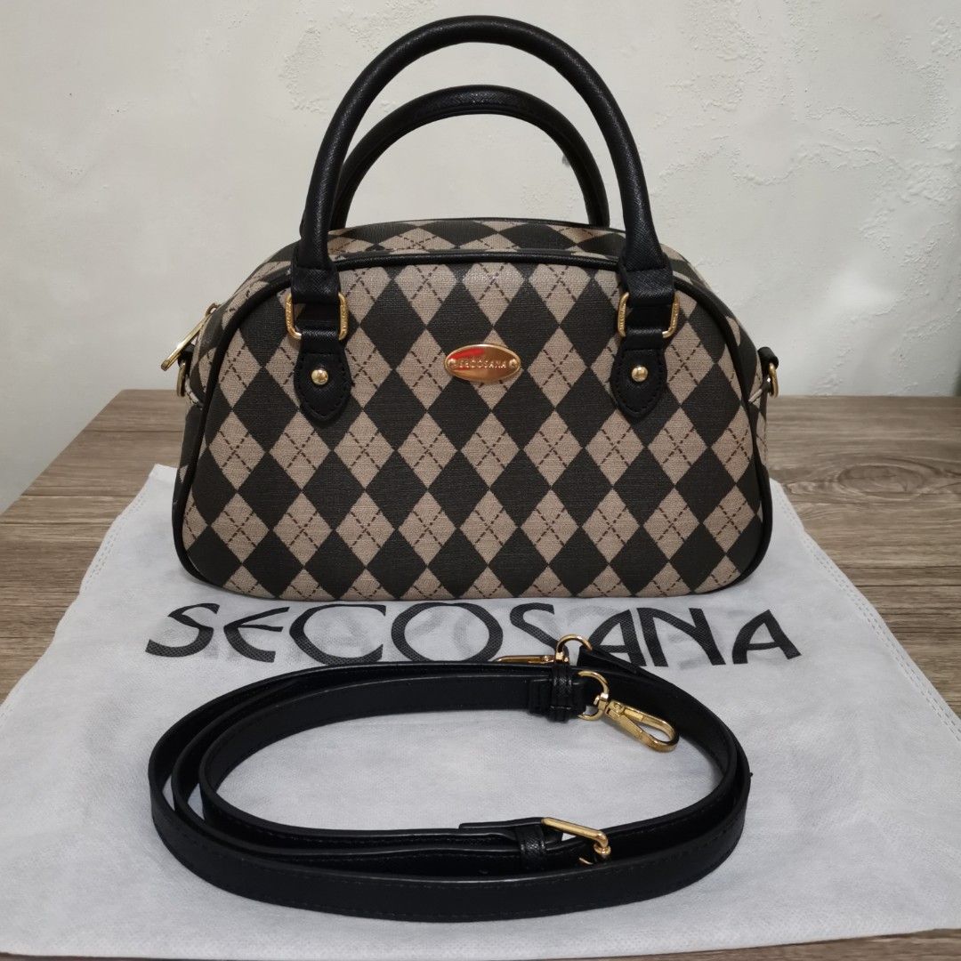 Handbag Sling Bag (Category: Shoulder Bags) located in Bacoor. Submitted by bloomingpetals (Listing ID 1464995361, Image 1). Description: 👜 For Sale: SECOSANA Handbag / Sling Bag ₱500 FIXED Selling my Secosana handbag, which can also be worn as a sling/crossbody bag. • Condition: Like new / very good condition • Clean and well-maintained • Structured and still in great shape • Can be carried as a handbag or worn as a sling • Gold hardware still 