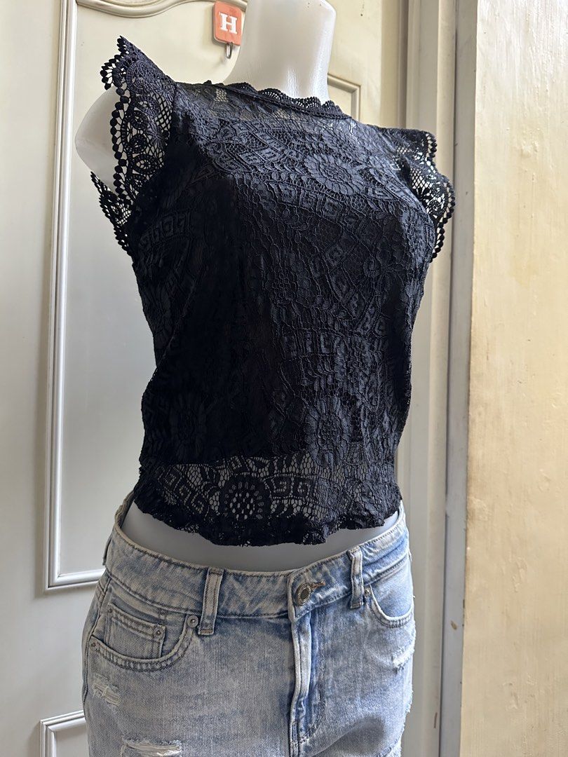 Black Lace Cap Sleeve Top S -Semi M (Category: Sleeveless) located in Calapan. Submitted by shakalak (Listing ID 1465008470, Image 3). Description: Black lace top with intricate floral patterns throughout. Cap sleeves feature scalloped edges. Sheer fabric at the upper chest and shoulders. Pair it with denim shorts or a patterned skirt for a casual day out. Great versatile piece for your wardrobe. Small -Semi Medium.
