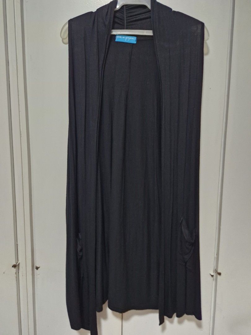 Black Long Open Cardigan Cover Up (Category: Coats, Jackets and Outerwear) located in San Juan City. Submitted by lss88 (Listing ID 1464971706, Image 1). Description: - Color: Black - Style: Open-front, long flowy silhouette - Fabric: Stretchy, comfortable knit - Features: Clean hem, tidy stitching, sleeveless/thin strap layering design - Best for: Pairing with basic tops and jeans for effortless everyday style.