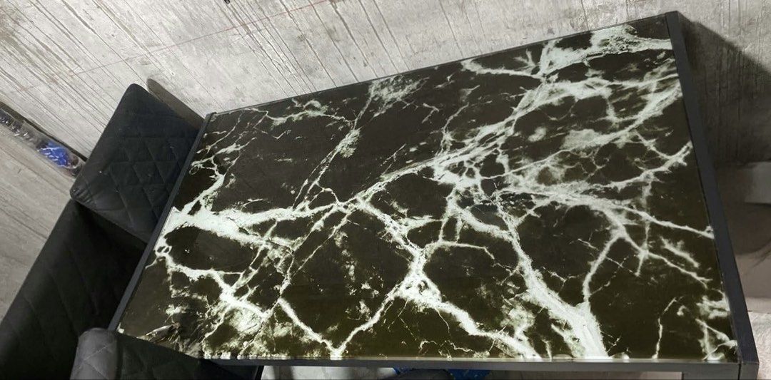 Black marble top dining table with dark chairs (Category: Tables & Sets) located in Manila. Submitted by eylalalaaa (Listing ID 1465023572, Image 1). Description: MOVE OUT SALE 💗 4-SEATER DINING SET slightly used but in good condition ₱4,199 negotiable for sure buyer 📍manila rfs: moving out.