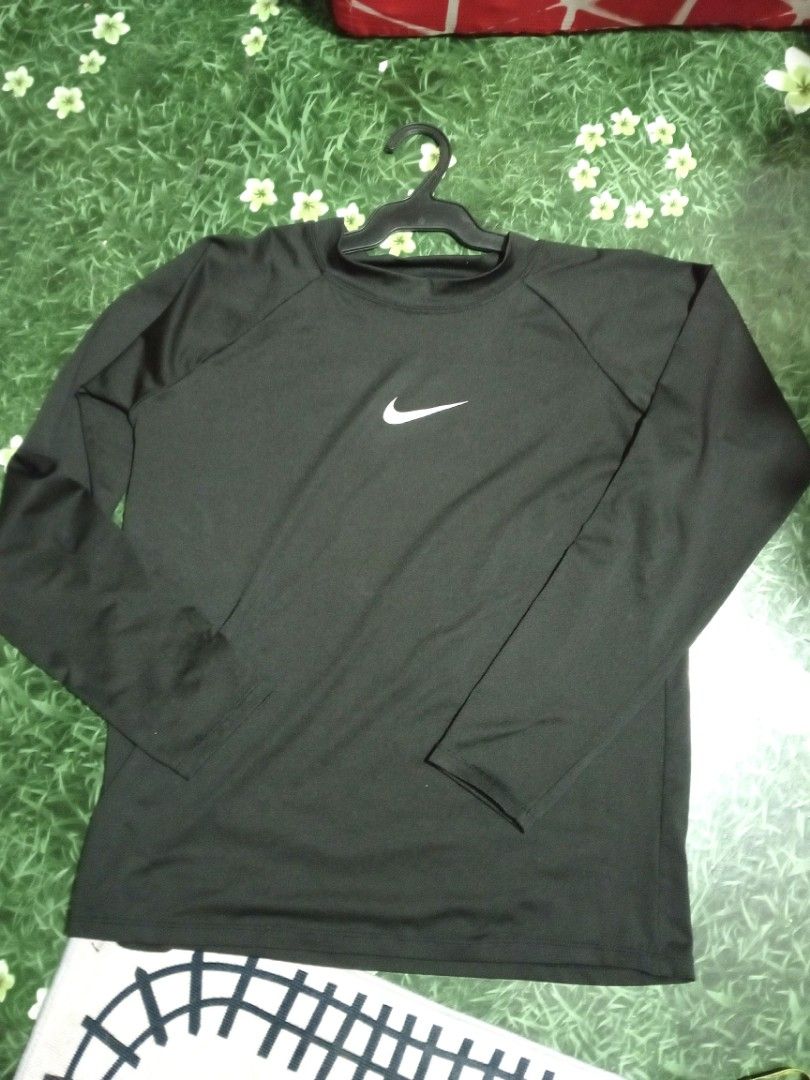 Black Rashguard for men (Category: Swim Top & Rash Guards) located in Cainta. Submitted by ziannika28 (Listing ID 1465005704, Image 1). Description: Size XL on tag (Used once only) Color:Black Chest:19 inch Length:25 inch.