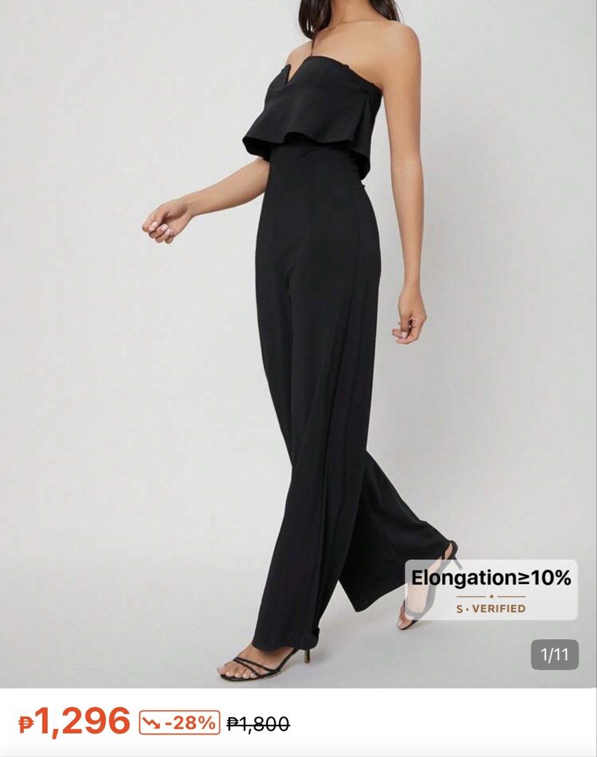 Black Strapless Ruffle Overlay Jumpsuit (Category: Jumpsuits) located in Pasig City. Submitted by jnzmrq1003 (Listing ID 1465010861, Image 1). Description: - Color: Black - Style: Strapless jumpsuit with layered ruffle top - Fit: High-waisted with long, wide-leg trousers - Design: Clean silhouette with minimal details - Occasion: Ideal for evening events, dinners, and formal outings - Styling: Easy to dress up with heels and minimal accessories.