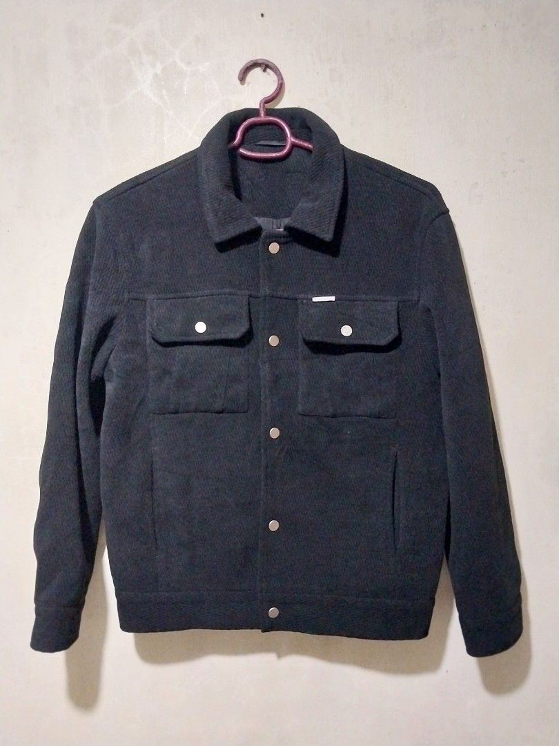 Black textured button-up jacket with 2 side pockets (Category: Coats, Jackets and Outerwear) located in Manila. Submitted by PrinceDani.Clothing (Listing ID 1465017269, Image 3). Description: Black textured button down jacket with 2 side pockets small to medium fit 20.5in width 24in length excellent condition .
