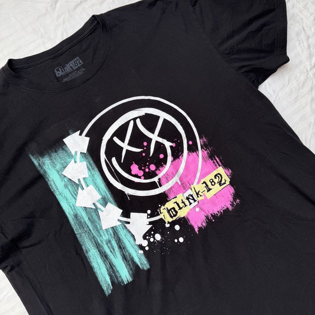 BLINK 182 (Category: Tshirts & Polo Shirts ) located in Pasig City. Submitted by jaaard (Listing ID 1464986836, Image 2). Description: Size XL 24x29.5 dimes Excellent condition 1pinhole issue side neckline part see last pic.