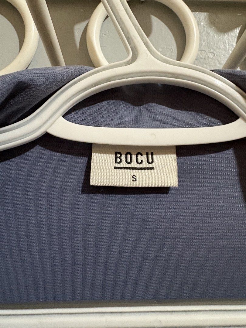 BOCU Thick Placket Wide Sleeve Boxy Polo Size S (Category: Blouses) located in Manila. Submitted by margascloset_ (Listing ID 1465058763, Image 2). Description: BOCU Women’s Thick Placket Wide Sleeve Dusty Blue Boxy Polo - Small on tag - Cropped length - Condition: lightly used & has slight discoloration on the collar; pre-loved RFS: Decluttering MOD: J&t, LBC, Lalamove, Grab MOP: Gcash / Bank.