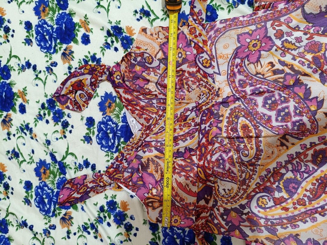 Bohemian Dress (Category: Dresses) located in Limay. Submitted by lisa_2318 (Listing ID 1464980932, Image 3). Description: bohemian-style tiered maxi dress featuring a vibrant, multi-colored paisley print dominated by pink, purple, magenta, and orange tones..