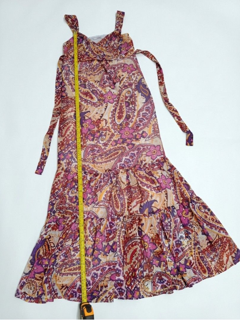 Bohemian Dress (Category: Dresses) located in Limay. Submitted by lisa_2318 (Listing ID 1464980932, Image 2). Description: bohemian-style tiered maxi dress featuring a vibrant, multi-colored paisley print dominated by pink, purple, magenta, and orange tones..