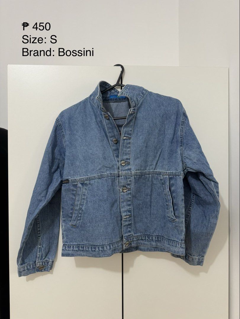 Bossini Denim Jacket Size S (Category: Coats, Jackets and Outerwear) located in Binan City. Submitted by izza1311 (Listing ID 1465019635, Image 1). Description: - Brand: Bossini - Style: Classic denim jacket in light blue wash - Size: S (fits true to size) - Features: Button-up front, structured collar, and front pockets .