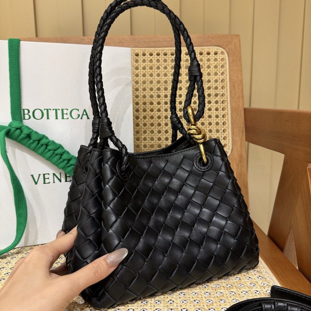 Bottega Veneta Parachute Small Black (Category: Luxury Bags & Wallets) located in Manila. Submitted by poppyany (Listing ID 1465160315, Image 1). Description: Bottega Veneta Parachute Bag Small size in black. With long strap for crossbody. Comes with dustbag and box. Unused, kept in storage only since bought. .