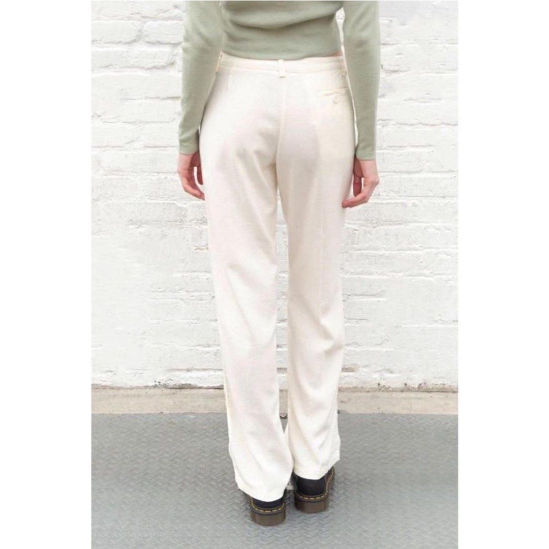 BRANDY MELVILLE AMELIA PANTS (Category: Jeans) located in Angeles City. Submitted by chic.haven (Listing ID 1465088318, Image 2). Description: - Color: Cream white - Fit: High-waisted with a straight leg silhouette - Details: Front pleats, belt loops, and clean back pockets - Style: Minimalist staple that is easy to dress up or down - Pairing: Looks great with cropped sweaters or basic tees.