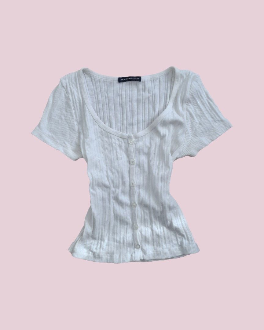 brandy melville white ribbed knit button down top (Category: Blouses) located in Cainta. Submitted by thepinkkeep (Listing ID 1465073253, Image 1). Description: 🎀 brandy melville white ribbed knit button down top ⋆. 𐙚˚࿔ 𝓪𝓿𝓪𝓲𝓵𝓪𝓫𝓵𝓮 𝜗𝜚˚⋆ size: s no flaws ! mine - 299 steal - 319 grab - 339 lock - 399 unavailable bids will be marked by an ❌ an 8-hour duration before order confirmation or release to next bidder will be take effect once a 