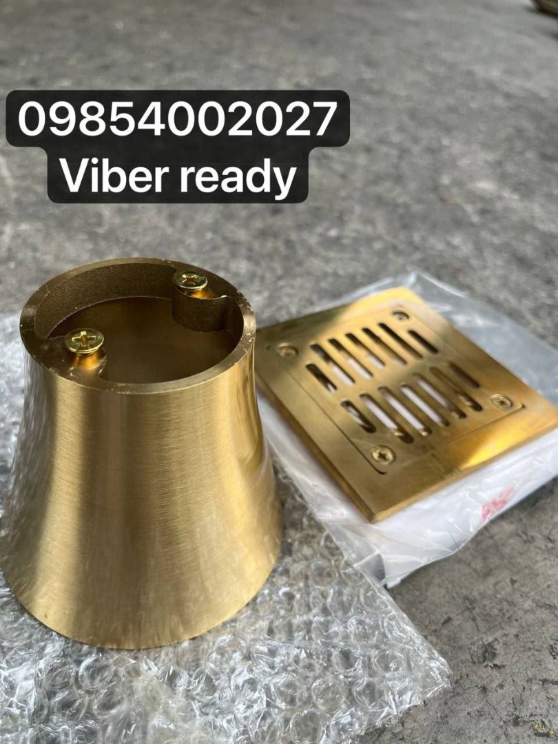 Brass Floor Drain and Funnel Set (Category: Bathroom & Kitchen Fixtures) located in Caloocan City. Submitted by _jane25 (Listing ID 1465007625, Image 1). Description: - Material: Solid brass with premium gold finish - Inclusions: Square grate, funnel adapter, and mounting screws - Condition: Brand new, unused parts still in original protective plastic and bubble wrap - Perfect for upgrading your bathroom or kitchen drainage with a touch of elegan