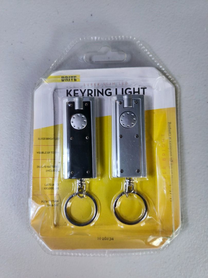 Brite Super Slim LED Keyring Light 2 Pack (Category: Lighting) located in San Leonardo. Submitted by burgossanleonardo.12345 (Listing ID 1465052079, Image 1). Description: - 2-Pack Super Slim LED Keyring Lights (1 Black & 1 Silver) - Super bright LED bulbs visible up to 2km away - Handy for home, outdoor, camping, and emergencies - Easy push-button on/off operation - Long-lasting bulbs up to 100,000 hours - Batteries included (3 x AG10 per light)