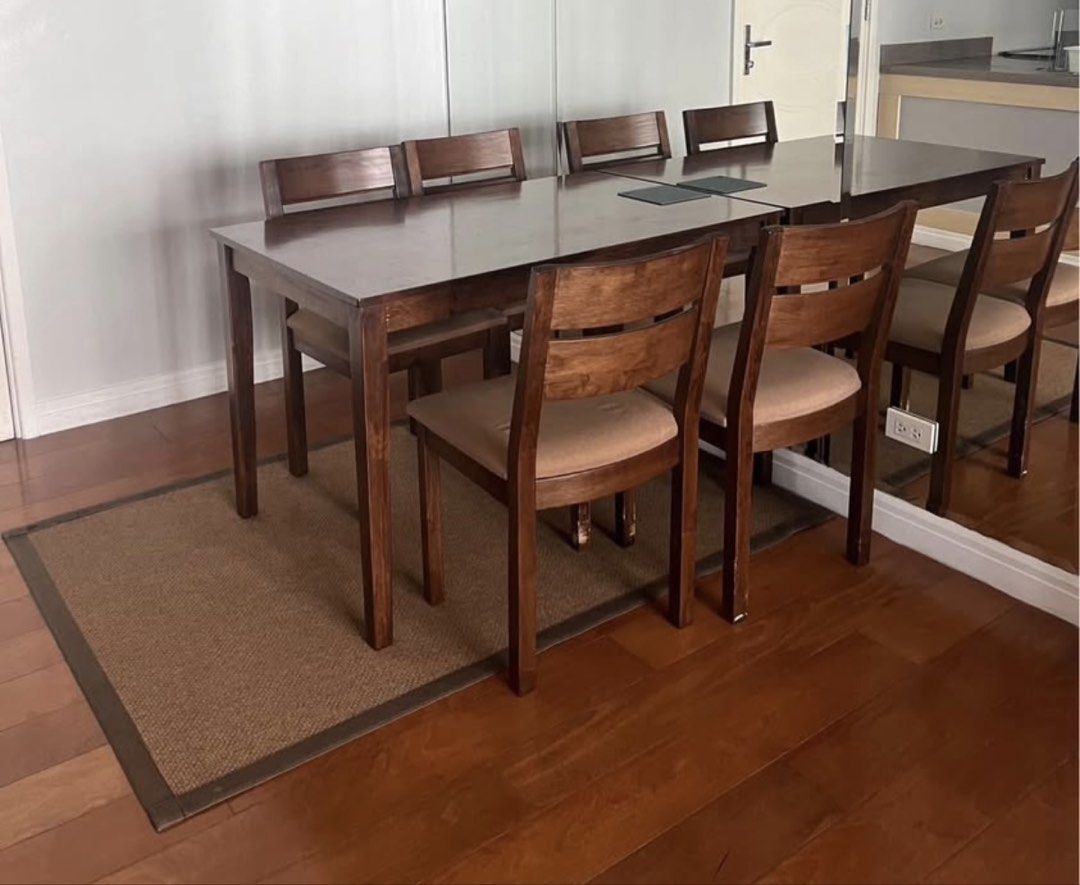 Brown Area Rug with Dark Border (Category: Carpets, Mats & Flooring) located in Muntinlupa City. Submitted by secondhandlove12345 (Listing ID 1465005390, Image 2). Description: - Brown woven area rug with a stylish darker brown solid border - Perfect size to fit underneath a dining room table setup - Textured surface adds warmth and character to your space - Neat bound edge finish for durability and a clean look - Instantly grounds and completes 