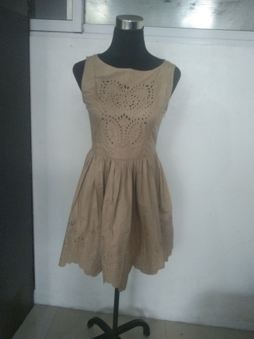 Brown cotton dress (Category: Dresses) located in San Fernando. Submitted by kitkat.astina (Listing ID 1465024138, Image 1). Description: eyelet embroidery on lower skirt and front and back top cotton tape measurements front: shoulder: 13 inches bust: 15 inches waist: 14 inches length: 32 inches not used.