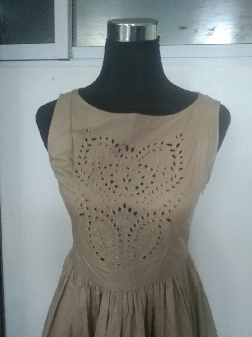 Brown cotton dress (Category: Dresses) located in San Fernando. Submitted by kitkat.astina (Listing ID 1465024138, Image 2). Description: eyelet embroidery on lower skirt and front and back top cotton tape measurements front: shoulder: 13 inches bust: 15 inches waist: 14 inches length: 32 inches not used.