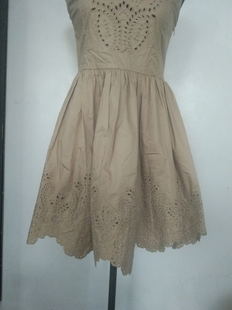 Brown cotton dress (Category: Dresses) located in San Fernando. Submitted by kitkat.astina (Listing ID 1465024138, Image 3). Description: eyelet embroidery on lower skirt and front and back top cotton tape measurements front: shoulder: 13 inches bust: 15 inches waist: 14 inches length: 32 inches not used.