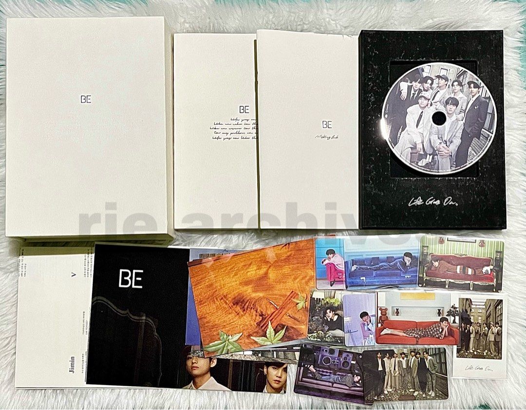 BTS BE Deluxe Edition (Category: K-Wave Merchandise) located in Manila. Submitted by ciciriee (Listing ID 1465032871, Image 1). Description: - Official BTS BE Album Set - Includes outer box, photobook, lyric book, and CD in black holder - Comes with complete member photocards, polaroids, and posters - Everything pictured is included in the bundle - 100% official merchandise dm for more inquiries !!.