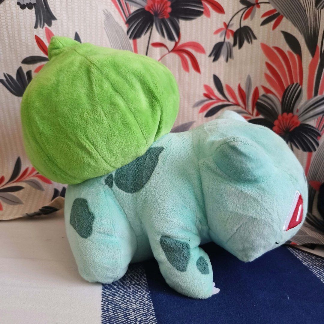 Pokémon Bulbasaur Plush Stuffed Animal Toy (Category: Plushies & Soft Toys) located in Zamboanga. Submitted by keijijean (Listing ID 1465044172, Image 2). Description: Dimension: 8” RFS: DECLUTTERING, MOVING TO OTHER PLACE MOD: JNT | LBC MOP: GCASH | BPI | LANDBANK ON HAND AND READY TO SHIP! CONDITION: WHAT YOU SEE IS WHAT YOU GET. Please check all the photos for the condition of every item/s. Some of the items have scratches, marks, or discolora