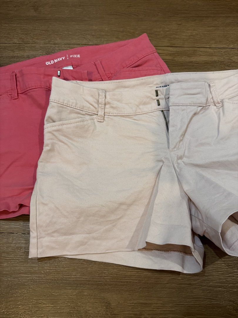 BUNDLE Old Navy Pixie Shorts (Category: Shorts) located in Paranaque City. Submitted by TrendyBoutique.ph (Listing ID 1465015845, Image 1). Description: - Brand: Old Navy - Model: Pixie Shorts - Size: 0 Regular - Colors: Bright pink and soft beige/blush - Features: Classic zip fly with hook-and-bar closure, belt loops, and front pockets - Condition: Great warm-weather staples - Bundle: Selling together as a set.
