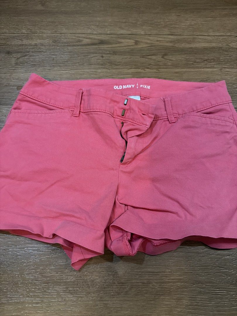 BUNDLE Old Navy Pixie Shorts (Category: Shorts) located in Paranaque City. Submitted by TrendyBoutique.ph (Listing ID 1465015845, Image 2). Description: - Brand: Old Navy - Model: Pixie Shorts - Size: 0 Regular - Colors: Bright pink and soft beige/blush - Features: Classic zip fly with hook-and-bar closure, belt loops, and front pockets - Condition: Great warm-weather staples - Bundle: Selling together as a set.