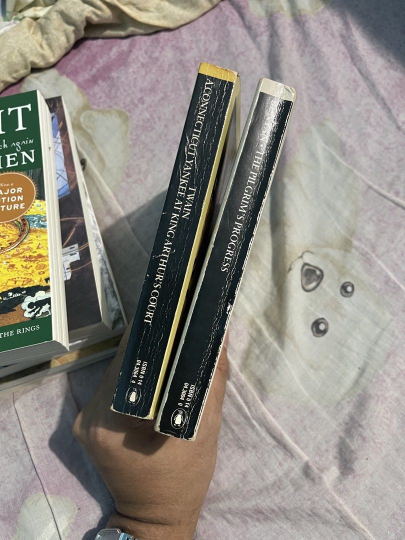 [Bundle] Penguin Classics: Mark Twain and John Bunyan (Category: Storybooks) located in Bulacan. Submitted by keen72811 (Listing ID 1465100013, Image 3). Description: - Set of 2 classic Penguin Classics paperbacks - Includes: A Connecticut Yankee at King Arthur's Court (Mark Twain) and The Pilgrim's Progress (John Bunyan) - Condition: Pages have natural age tanning; covers have minor wear around edges - Selling both together as a bundle - Perfect
