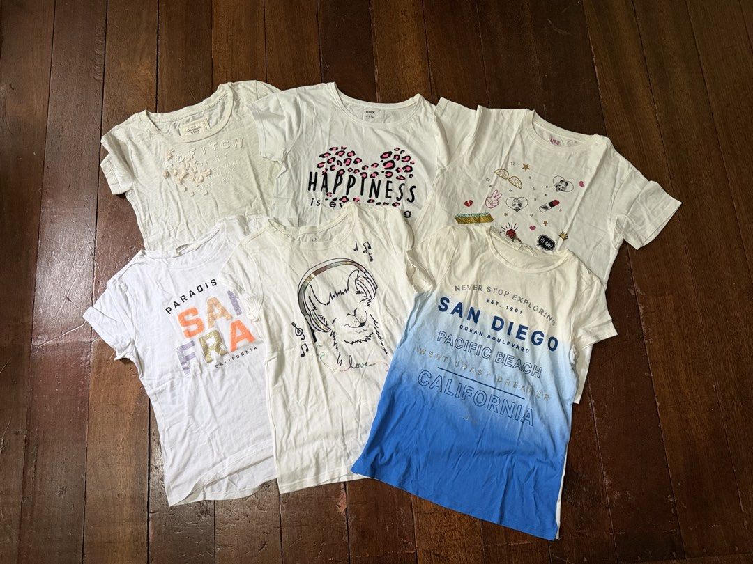 Bundle Sale for Girls (Category: Babies & Kids Fashion) located in Quezon City. Submitted by pateeangel (Listing ID 1465005574, Image 2). Description: 📍Take all (6 tops & 3 bottoms) for 1,000 pesos 📍Branded tops and bottoms 📍Fits 9-12yo 📍some have washable dirt due to storage 📍Tops - Brand: Max (white tee with Happiness print) 15-16 yo on tag - Brand: Gap white tee XXL on tag (runs small) - Uniqlo (LOL design) 140 on tag - H&M (San Fran prin