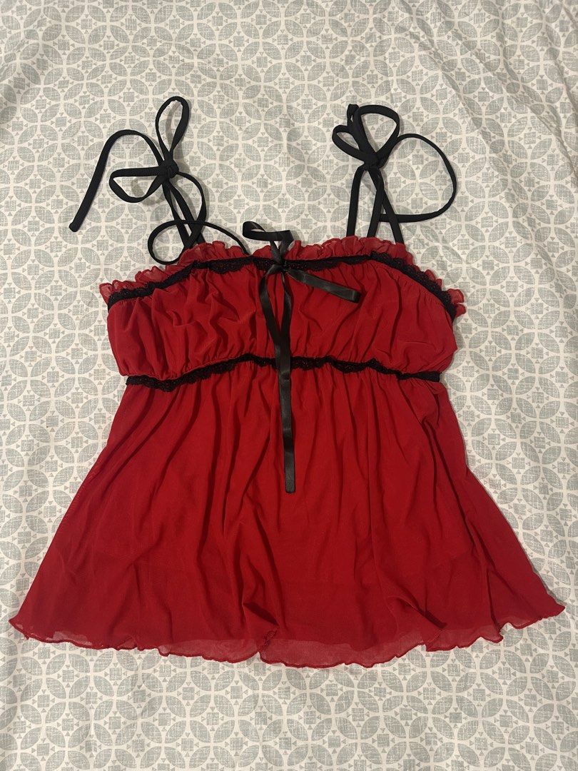 (Bundle) SHEIN Red Cami Top & Grey Lace Camisole Bundle (Category: Sleeveless) located in Cavite. Submitted by lacebuys (Listing ID 1465141762, Image 1). Description: - Set of 2 cute camisole tops in Size XS - Piece 1: Red Shein cami featuring black ribbon details and contrast trim - Piece 2: Grey ribbed camisole with delicate lace trim at the neckline and hem, plus a sweet embroidered heart logo near the bottom - Versatile basics that are super 