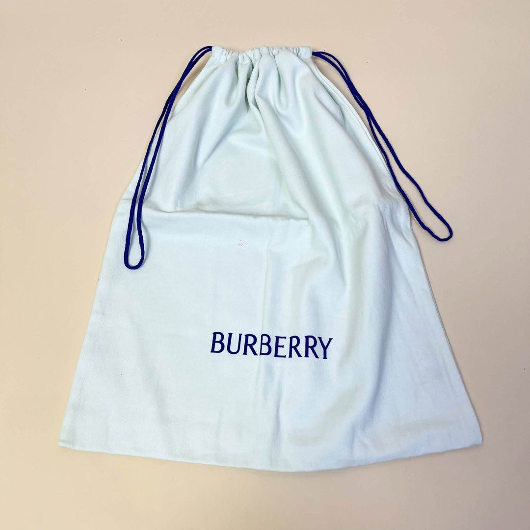 Burberry Dust Bag (Category: Tote Bags) located in Llanera. Submitted by denxlab (Listing ID 1465091701, Image 1). Description: ✨ FOR SALE | AUTHENTIC BURBERRY DUST BAG ✨ Decluttering a piece from my personal luxury collection 🤎 Authentic Burberry cotton drawstring dust bag featuring the classic blue Burberry logo and blue drawstrings. Perfect for storing your Burberry bags, shoes, accessories, or even as a collection piece. 👜✨ 📏 Size: 36 × 43