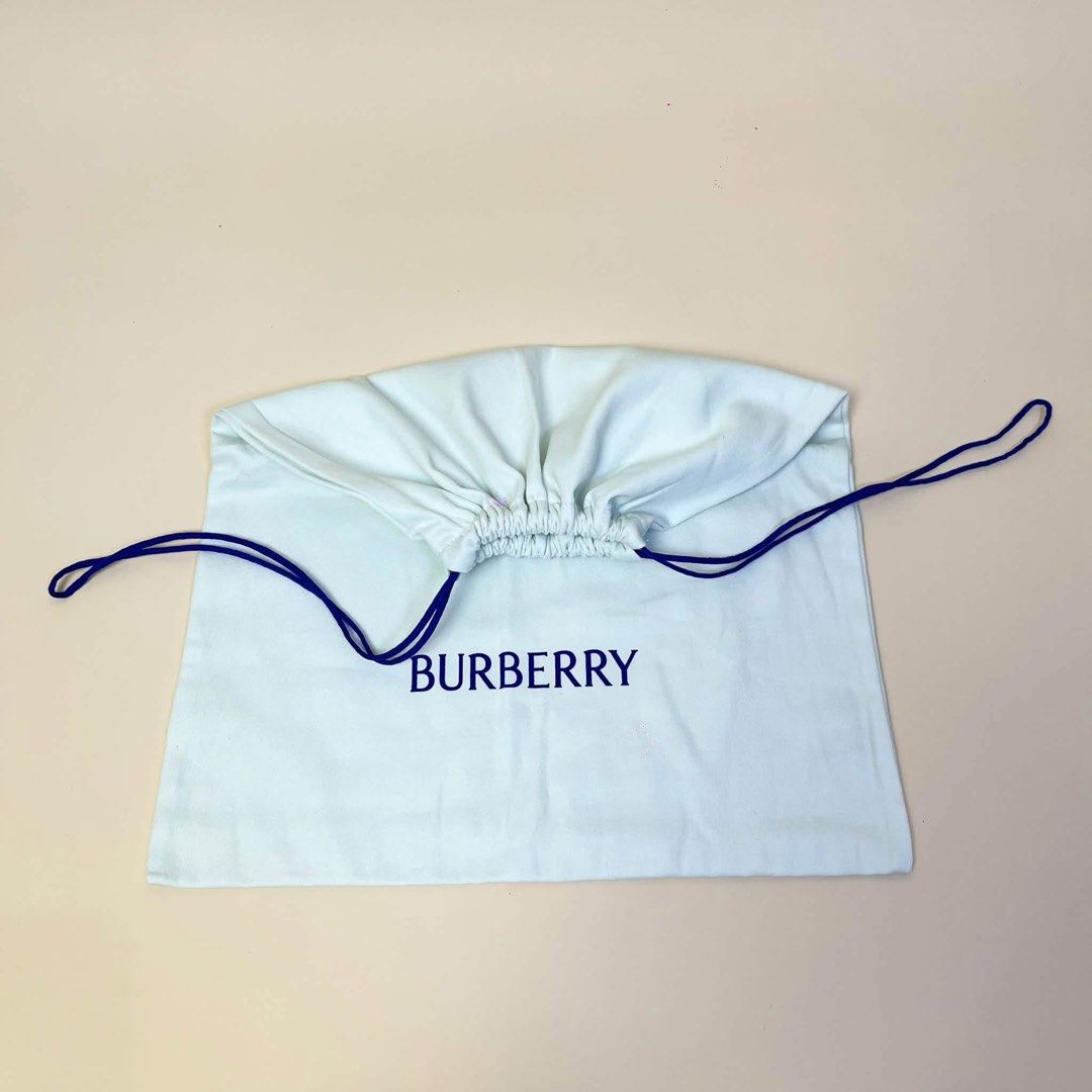 Burberry Dust Bag (Category: Tote Bags) located in Llanera. Submitted by denxlab (Listing ID 1465091701, Image 3). Description: ✨ FOR SALE | AUTHENTIC BURBERRY DUST BAG ✨ Decluttering a piece from my personal luxury collection 🤎 Authentic Burberry cotton drawstring dust bag featuring the classic blue Burberry logo and blue drawstrings. Perfect for storing your Burberry bags, shoes, accessories, or even as a collection piece. 👜✨ 📏 Size: 36 × 43