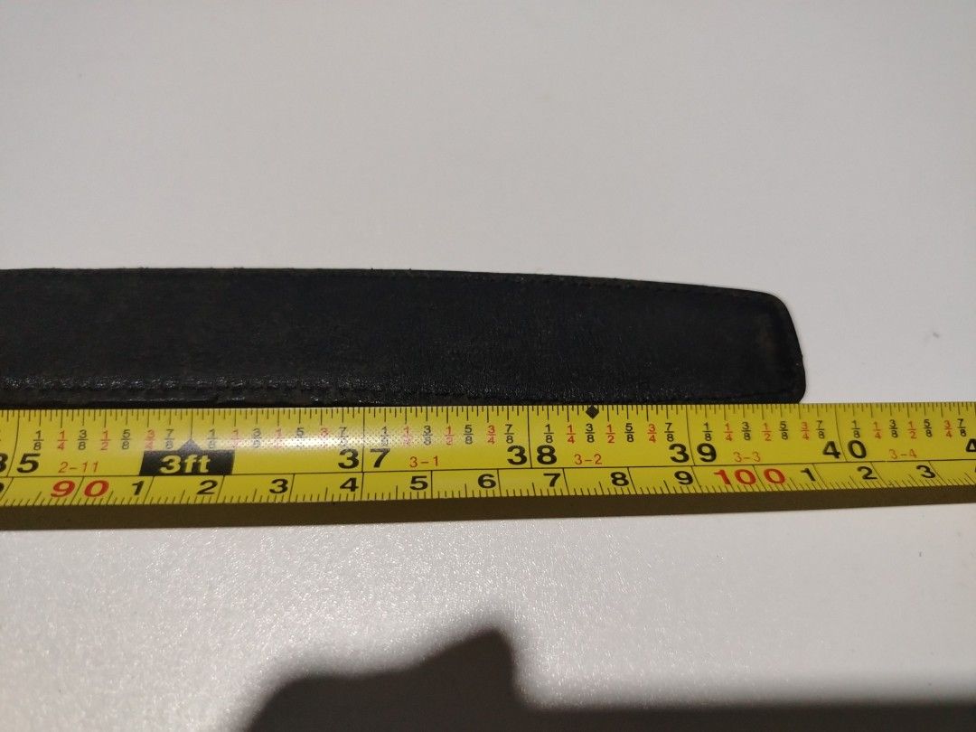 Burberry leather belt (Category: Luxury Accessories) located in Manila. Submitted by rockandrolly (Listing ID 1465107376, Image 3). Description: ✅ Brand: Burberry 🇬🇧 ✅ Material: High-quality smooth black leather ✅ Markings: Engraved BURBERRY on buckle + embossed branding inside strap ✅ Size: ~40" / 102cm — fits 32"–38" waist ✅ Buckle: Classic rectangular auto-lock design ✅ Condition: Pre-owned — leather in good shape; buckle has scratches from 