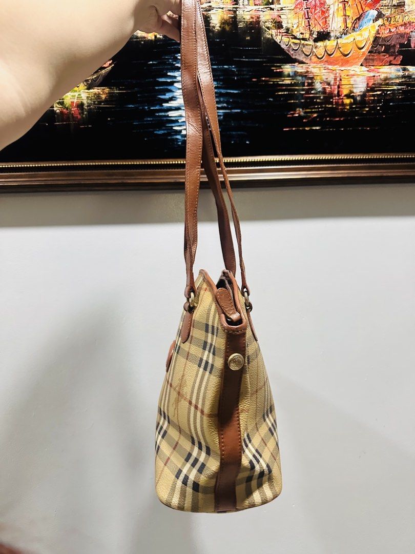 Burberry Long handle tote bag (Category: Tote Bags) located in Batangas. Submitted by stopandshopforluxury (Listing ID 1465110800, Image 3). Description: Guaranteed Original 💯 Check photos for your reference Disclaimer: This is a preloved bag. Actual condition is shown in photos. Expect normal signs of wear. Colors may slightly vary due to lighting. Please check all photos and ask questions before claiming. ❌ No return or exchange. ❌ .